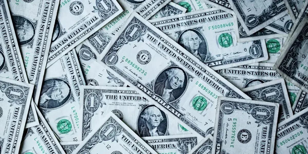 A stack of cash representing gift card resale value